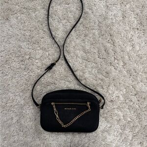 Michael Kors Black and Gold Crossbody Bag with Sleek Design